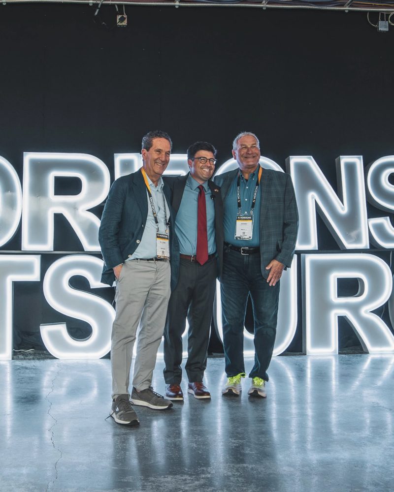 The Mayor of Pittsburgh at AI Horizons Pittsburgh in front of Party on Butler marquee letters