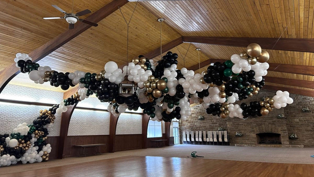 Colorful balloon garland and arch setup delivered and installed by Party on Butler for a Pittsburgh birthday celebration